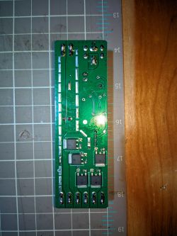 LED Controller PCB PCB of an LED controller on a measurement grid background.