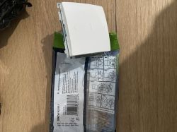 Roller shutter switch up/down placed on packaging with wiring diagram